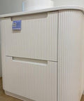 Close-up styling shot of the Aulic Curva 750mm floor standing vanity
