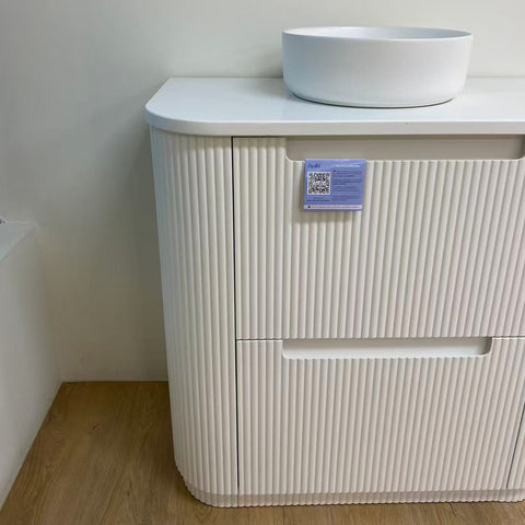 Close-up styling shot of the Aulic Curva 900mm floor standing vanity