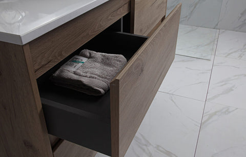 Aulic Max 600mm wall hung vanity styled in a bathroom