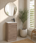 Aulic Revit 465mm floor standing vanity styled in a bathroom